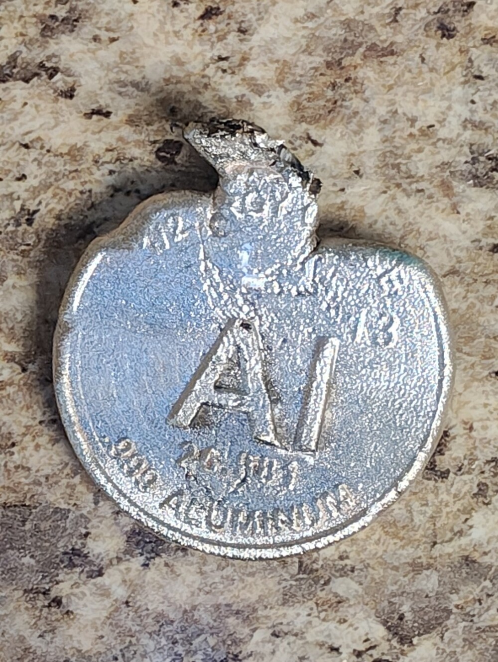 ERROR POUR: 53.8g Sterling Silver "Aluminum" Round. Under-spot first-run deal!